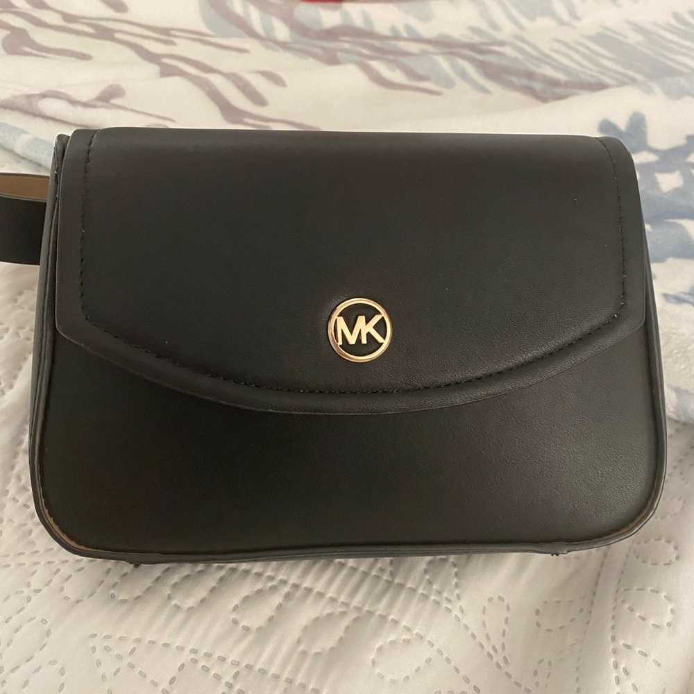 Michael Kors Black Crossbody Bag with Flap Closure and Gold Logo